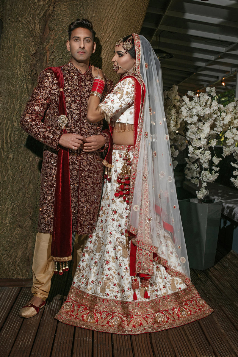 Off white and red 2025 bridal lehenga