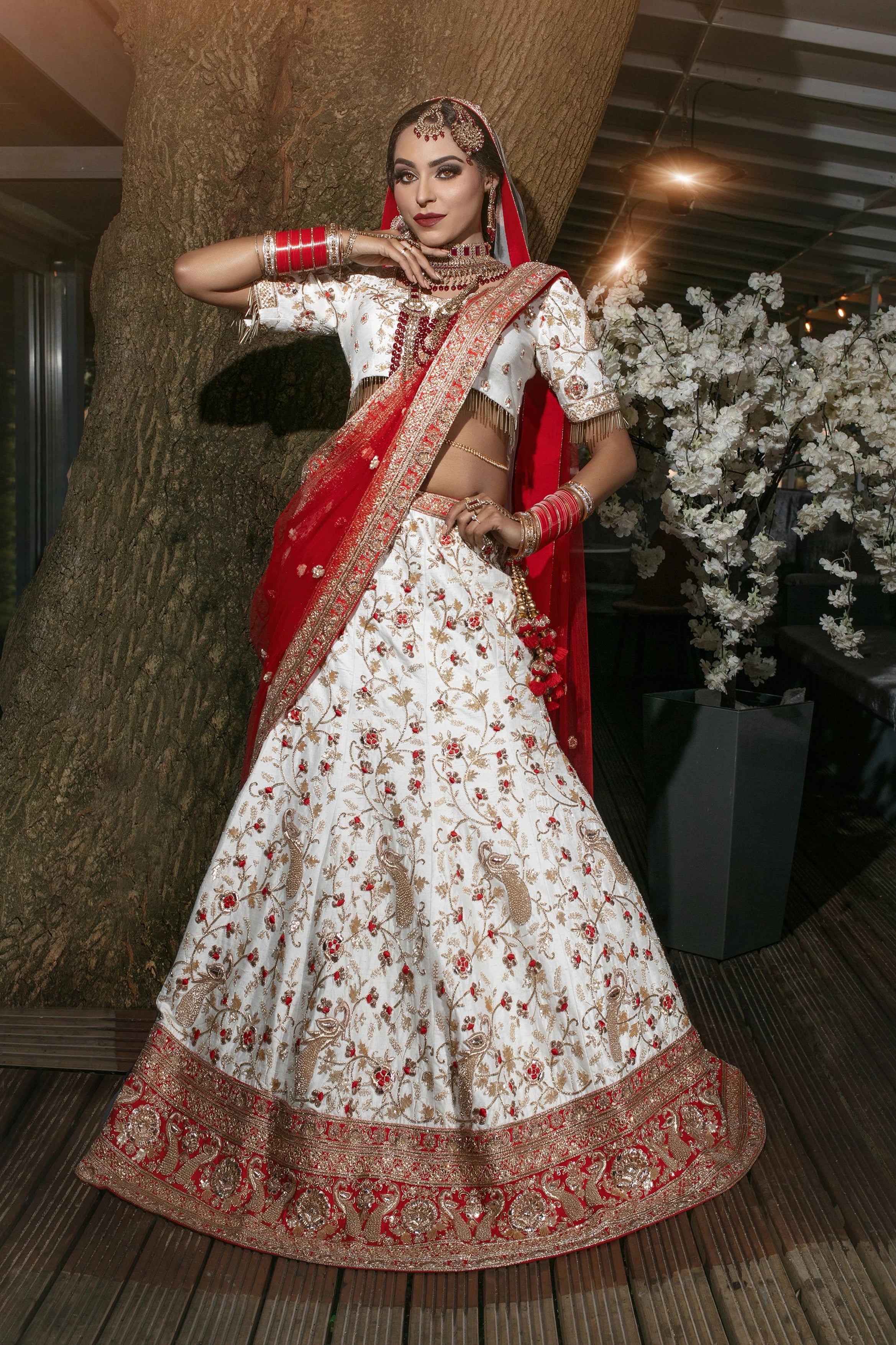 Traditional White and Red Raw Silk Wedding Bridal Paanetar Lehenga with Dual Georgette Dupattas. product title OORVI DESAI Designer Indian Wedding Dresses in London